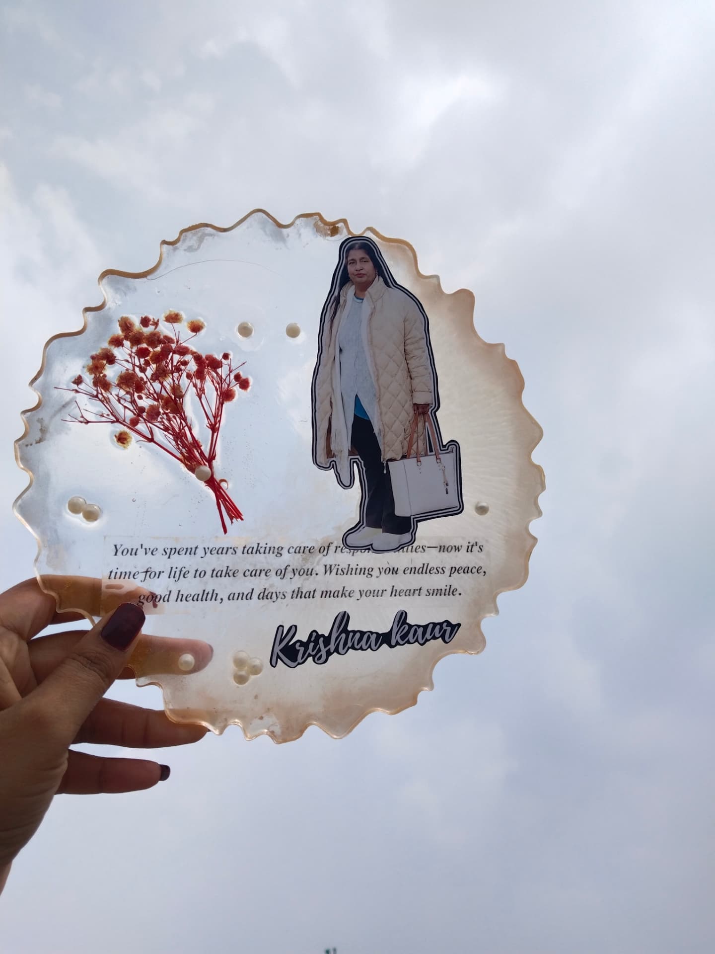 Personalised resin keepsake with a photograph, flowers and a heartfelt message